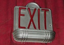 An exit sign over a doorway to the lobby. - , Utah