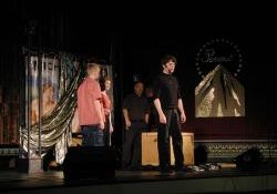Michelangelo, Utah's Premier Illusionist, prepares to do an illusion with the help of three volunteers from the audience. - , Utah