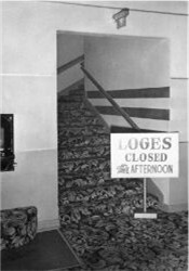 A sign saying 'Loges Closed Afternoon' blocks the stairway to the balcony. - , Utah