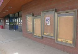Four poster cases, one for each theater, near the entrance of the City Square 4 Theater. - , Utah