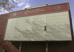 The sign of the City Square 4 Theater still bears the Carmike Cinemas logo.  Two sections of the attraction board are in need of repair. - , Utah