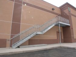 On the east side of the building is an outside stairway to the projection level of the theater. - , Utah