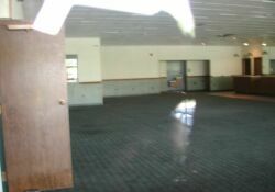 The east wall of the lobby.  Behind the door on the left were stairs up to the projection room.  The hall to the auditorium was between that door and the camera. - , Utah