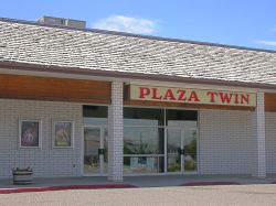 The front of the Plaza Twin.  The theater is listed in the phone book as the T & T Twin Theatres at the Plaza.  The 'T & T' stand for Tolbert Enterprises. - , Utah