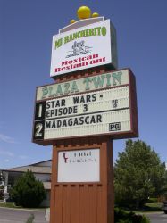 North side of the sign for the Plaza Twin Theatres.  Current features showing at the theater are Star Wars - Episode 3 and Madagascar. - , Utah