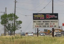 The sign of the drive-in has three lines of copy and is now used for the KLGL and KMTI radio stations. - , Utah