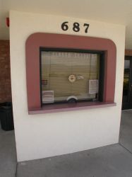 The address of the theater appears above the theater's single ticket window. - , Utah