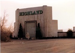 The original screen tower of the Highland Drive-In was made of concrete and featured the word 'Highland' in large letters on the back side.
