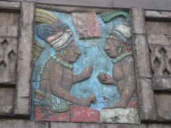 Along top of the Mayan's exterior are several friezes, such as this one of two Mayans in ceremonial dress.
 - , Utah