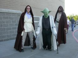 Yoda and two Jedi Knights walk along the east side of the Megaplex 17 at Jordan Commons while waiting for the midnight showing of 'Revenge of the Sith.' - , Utah