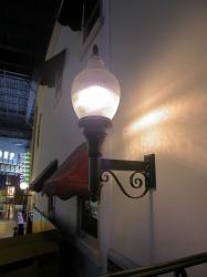 An old-fashioned street lamp mounted on the wall of the lobby. - , Utah