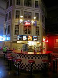 The Snappy Service restaurant has a circular counter with stools. - , Utah