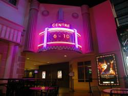 The marquee for the Centre Hall includes a miniature version of the Centre Theatre's 90-foot tower.  The marquee appears over the hall for theaters 6 through 10.