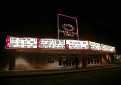 The entrance of the Layton Hills 9 theater by night.