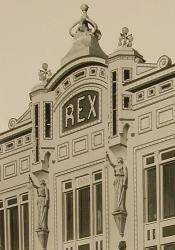 The name 'Rex' was displayed prominently at the top of the Rex Theatre.  Below the name and on either side are the statues of two women holding light globes. - , Utah
