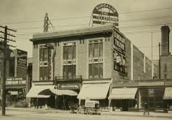 On 21 April 1909, the theater was known as the Bungalow Theatre.  The building also housed the Hotel Bungalow, which had a vertical sign on the front facade.  The theater had a large sign painted on the south side of the building. - , Utah