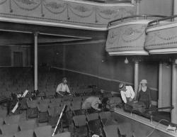 Workers recover of seats in the auditorium of the Wilkes Theater on on 27 August 1921. - , Utah