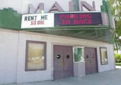 The name 'Main' appears on top of the theater's marquee.  An electronic sign has been added to the attraction board.  - , Utah