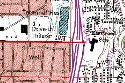 This geological survey map from 1975 shows the Motor-Vu Drive-In on 3300 South, just east of the I-215 freeway.  The screen was positioned on the east side of the drive-in, giving patrons a great view of the Salt Lake Valley.