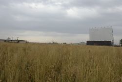 Theater 1 of the North Star Drive-In.  The projection building is on the left and the screen tower on the right. - , Utah