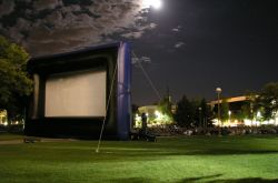 The back side of the Open Air Cinema with the moon in the sky above. - , Utah