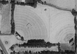 An aerial photo of the Pioneer Twin Drive-In in 1997.  The entrance of the drive in is in the lower right. - , Utah