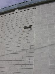 A boarded up window on the west side of the theater.  The window might be for one of the projection rooms.   - , Utah