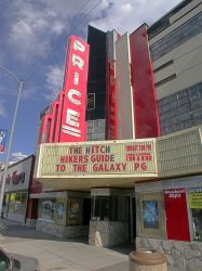 The marquee of the theater has a three-line attraction board and bears the name 'Price'. - , Utah