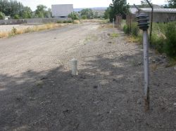 Beside the exit driveway is an old light pole. - , Utah
