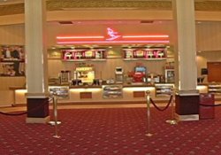The lobby of the Redstone 8 Cinemas has the snack bar in the center, with seating on the left and ticket counter and theater entrances on the right.  The main entrance is behind the camera. - , Utah