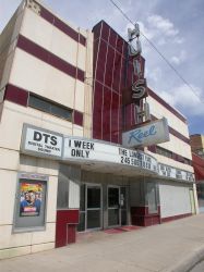 A two-line attraction board extends across the front of the Huish Reel Theatre. - , Utah