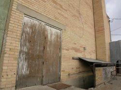 Next to one of the rear exit doors is a stairway down to the theater's boiler room. - , Utah