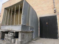 By the other auditorium exit is a large air intake for the air conditioning system. - , Utah