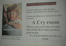 A poster in the lobby informs parents of the theater's cry room. - , Utah