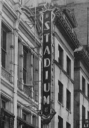 The Stadium Theatre had a long, vertical sign mounted on the upper story of the building. - , Utah