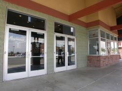 Two sets of entrance doors, with the ticket booth in the background. - , Utah