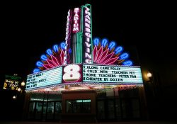 The Thanksgiving Point Stadium 8 theater has an impressive display of neon on its marquee.