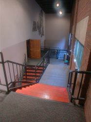 The north foyer of Trolley Corners Theater 1, from the top landing looking down. - , Utah