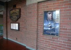 A poster for Master and Commander on the brick wall of the Trolley Corners theater. - , Utah