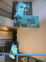 Paintings of old movie stars hang from the ceiling in the north end of the Trolley Corners Theater 1 lobby.    - , Utah