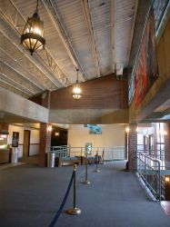 The lobby of Trolley Corners Theater 1.  The concession stand is on the left and the stairs down to the ticket booth are on the right. - , Utah
