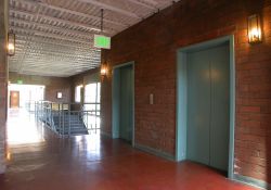 Two elevators provide access to offices on the fourth level of the Trolley Corners complex.