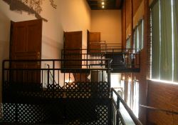 Moviegoers entered the large upstairs theater at Trolley Corners using doors at four different levels.  Stairways and landings filled the foyers on either side of the auditorium. - , Utah