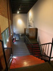Looking down at the south foyer of Trolley Corners Theater 1 from the top landing. - , Utah