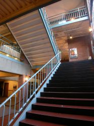 The main stairs for the Trolley Corners theater start in the lower level and continue upward to the level above the upper lobby. - , Utah