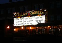 The sign for the Trolley Corners Theatres at night, from across the street. - , Utah