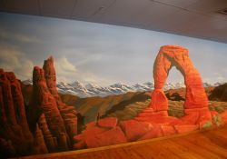 A mural of Utah scenery in the lobby by the east entrance. - , Utah