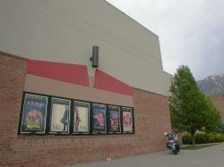 Six poster cases on the right side of the theater entrance. - , Utah